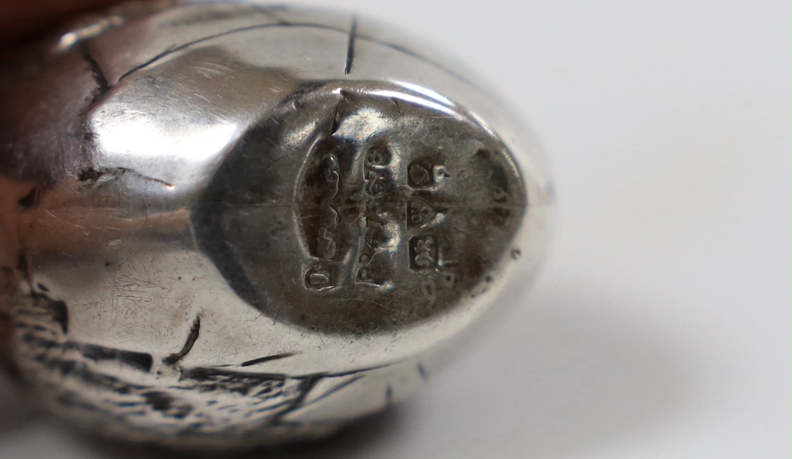 An early 20th century novelty silver mounted pin cushion, modelled as a hatching chick, Chester, 19??, maker's mark and date letter rubbed, height 36mm.
